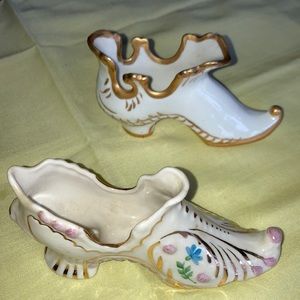 Lot of 2 porcelain hand-painted dec. shoes appx. 4 1/2” x 1”w. x 2” hi.  $20